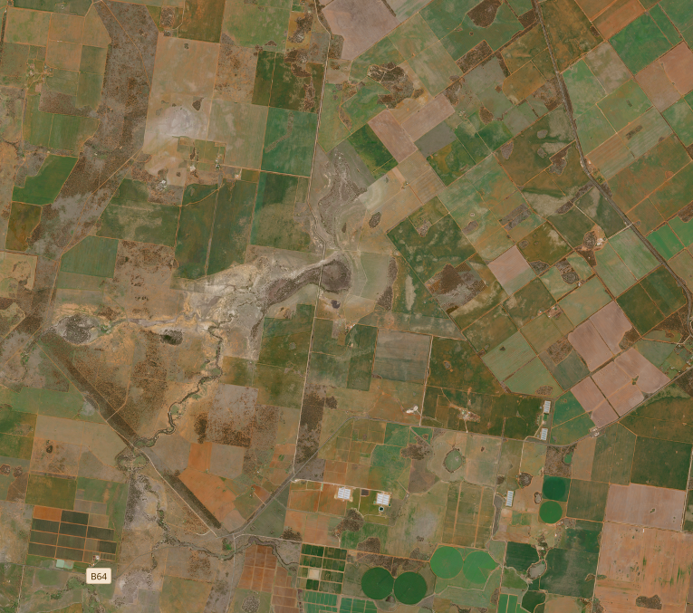 Picture of fields and a road, taken from satellite imagery data